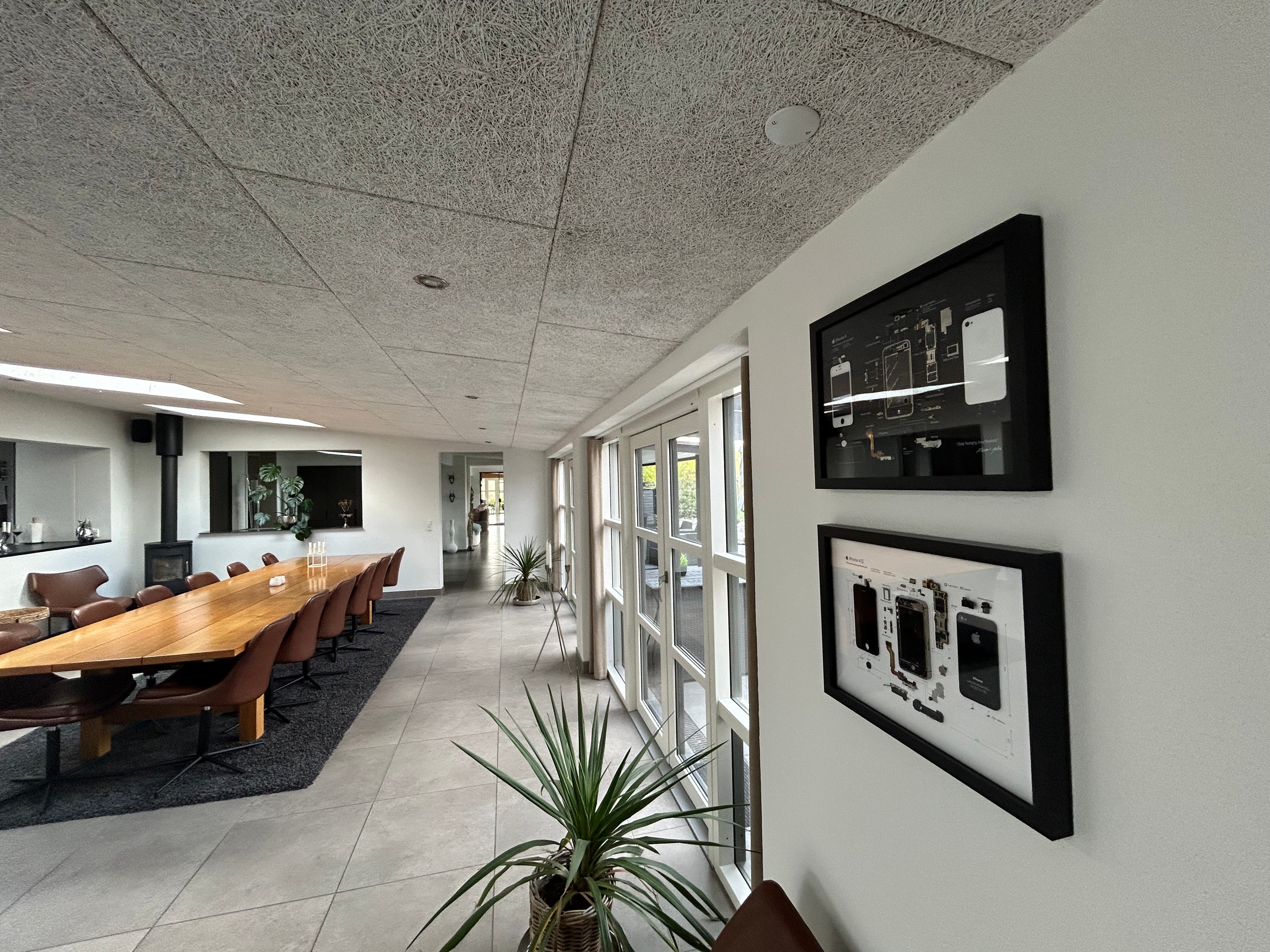 Customer photo of a framed tech product on a wall.